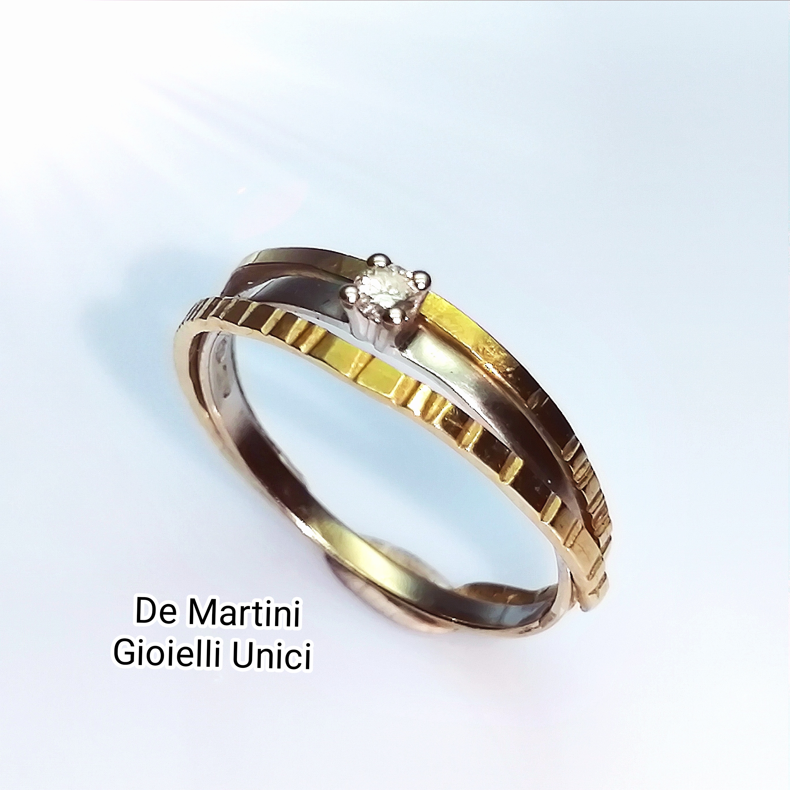 ANELLO ORO GIALLO E DIAMANTE mod. INTRECCIO